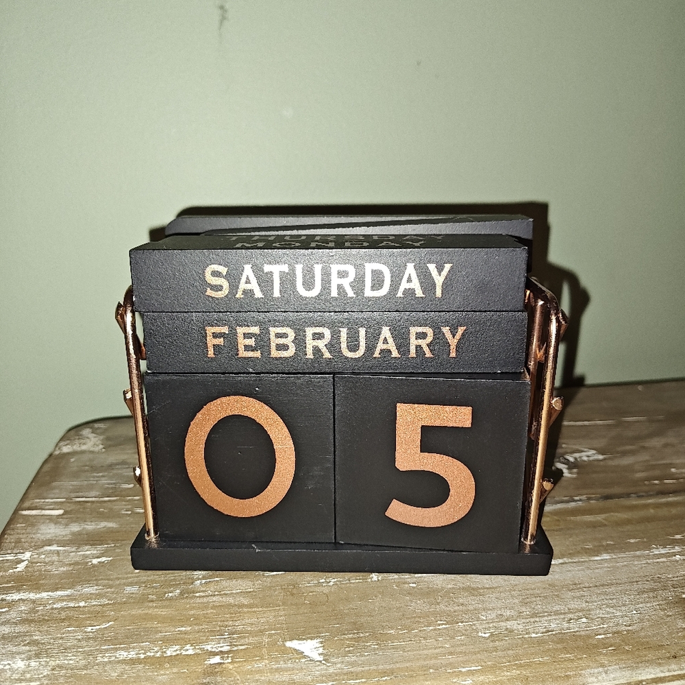 OwlCrate The Invisible Life of Addie LaRue wooden block desk calendar
